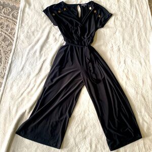 Black Dressy Romper With Pockets And Gold Color Buttons